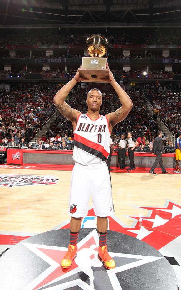 HOUSTON, TX - FEBRUARY 16: Damian Lillard #0 of the Portland Trail Blazers accepts the 2013 Taco Bell Skills Challenge trophy for Team West on State Farm All-Star Saturday Night as part of the 2013 NBA All-Star Weekend on February 16, 2013 at the Toyota Center in Houston, Texas. (Photo by Nathaniel S. Butler/NBAE via Getty Images)