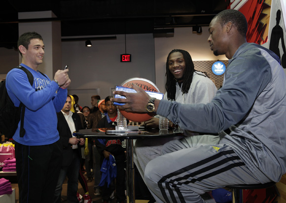  Kenneth Faried of the Denver Nuggets and Harrison Barnes of the Golden State Warriors meet fans at the adidas Store at Galleria Mall during NBA All-Star in Houston.