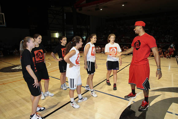 Derrick Rose of the Chicago Bulls meets fans at basketball event at Canal de Isabel II Sports Centre in Madrid during the adidas D Rose Tour.