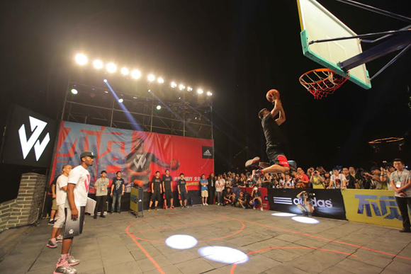 Beijing, China (August 19, 2014) – John Wall coaches participants in the slam dunk contest on the Great Wall of China