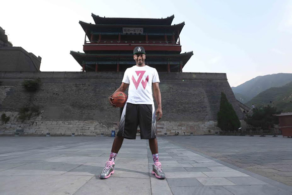 Beijing, China (August 19, 2014) – John Wall poses before meeting fans at the Great Wall of China