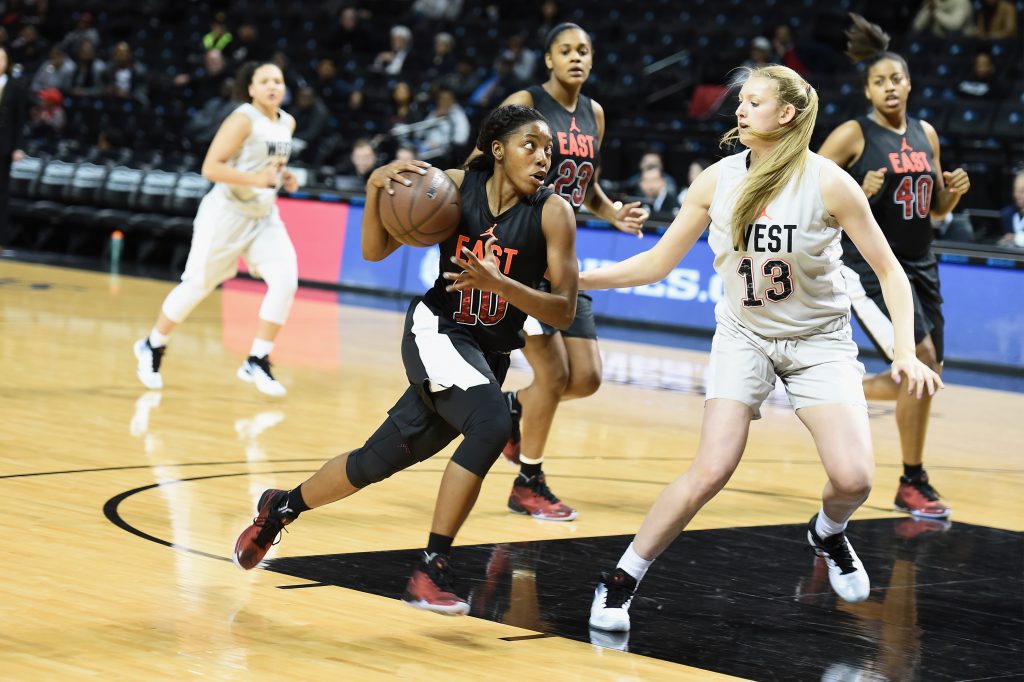 "NEW YORK, NY - APRIL 15: Kiara Lewis (Center) (Chicago, IL) in action for the East Team at the 2016 Jordan Brand Classic at Barclays Center on April 15, 2016 in New York City. (Photo by Dave Kotinsky/Getty Images for Jordan Brand )"