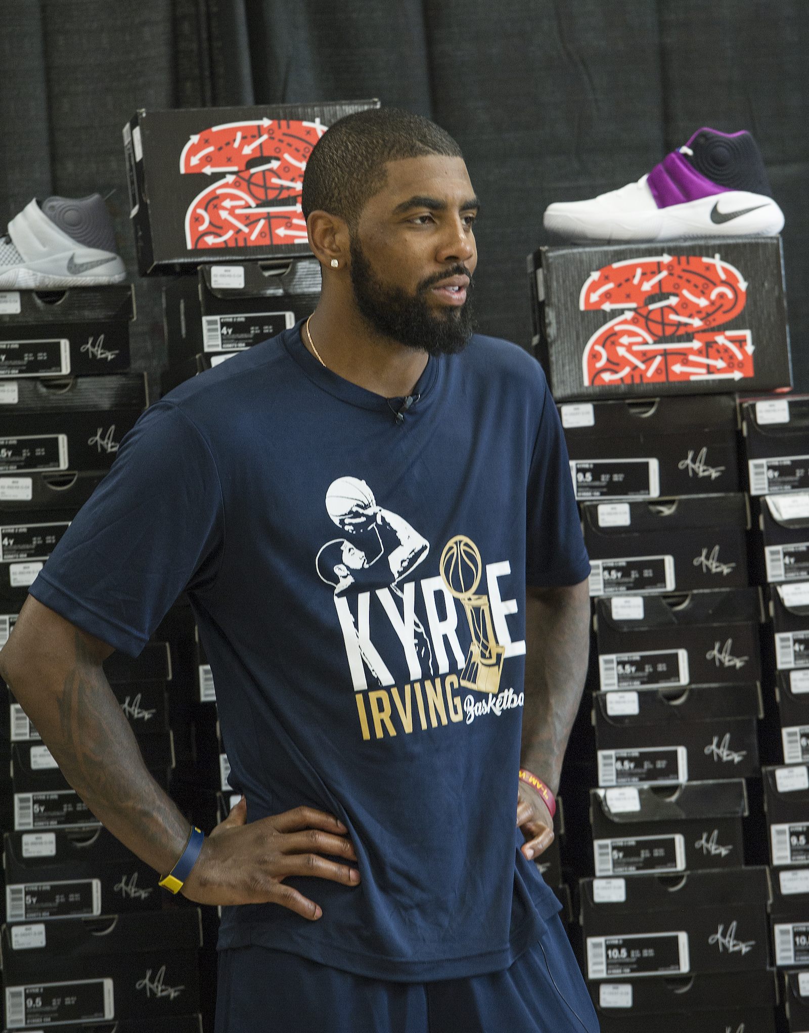 Cleveland Cavaliers star Kyrie Irving, in partnership with Kids Foot Locker, donated 190 pairs of sneakers to Boys & Girls Clubs of Cleveland, Saturday, July 9, 2016, in Independence, Ohio. The donation matched Irving's 190 points scored during the NBA championship series.  (Phil Long/AP Images for Kids Foot Locker)