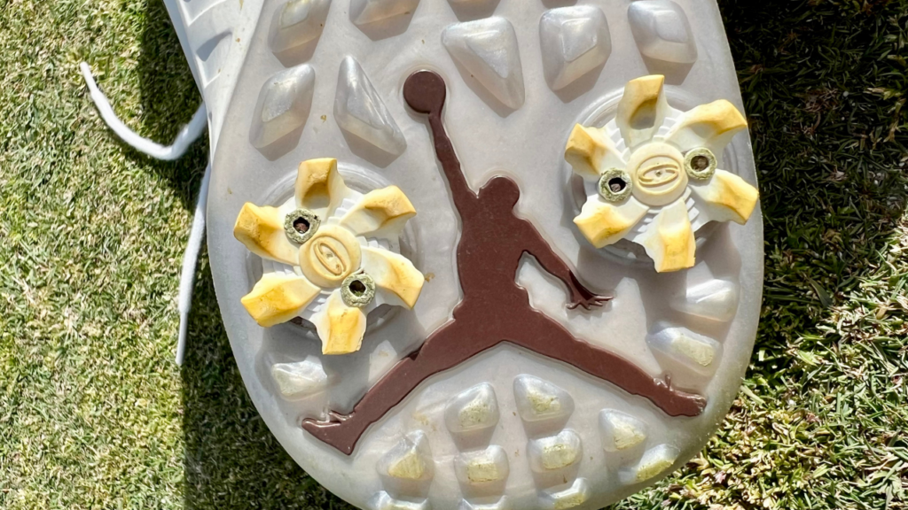 Air Jordan 9 G outsole logo and spikes