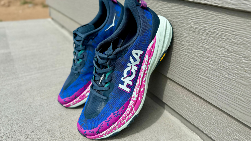 Hoka Speedgoat 6 leaning against a wall