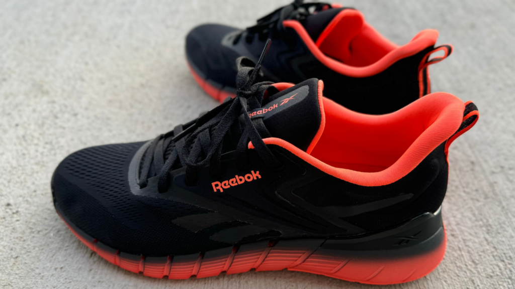 Reebok Nano Gym both shoes on concrete