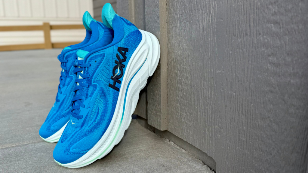 Hoka Clifton 10 leaning on wall