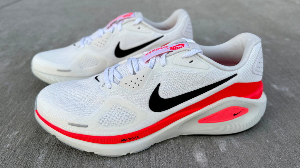 Nike Structure 26 both shoes on concrete
