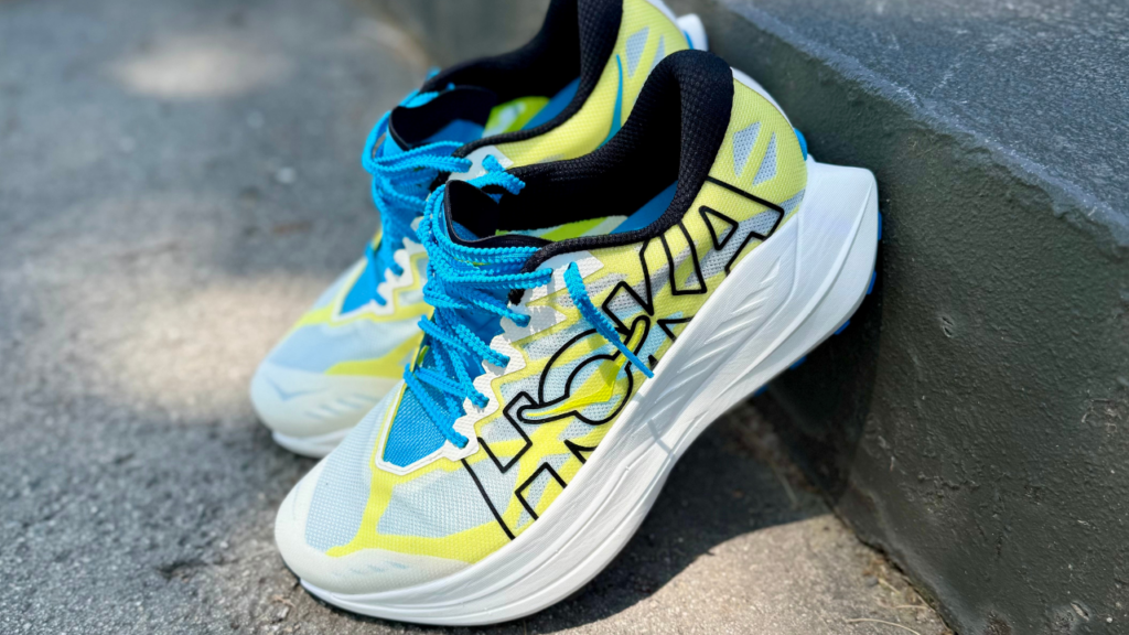 Hoka Rocket X Trail leaning on step