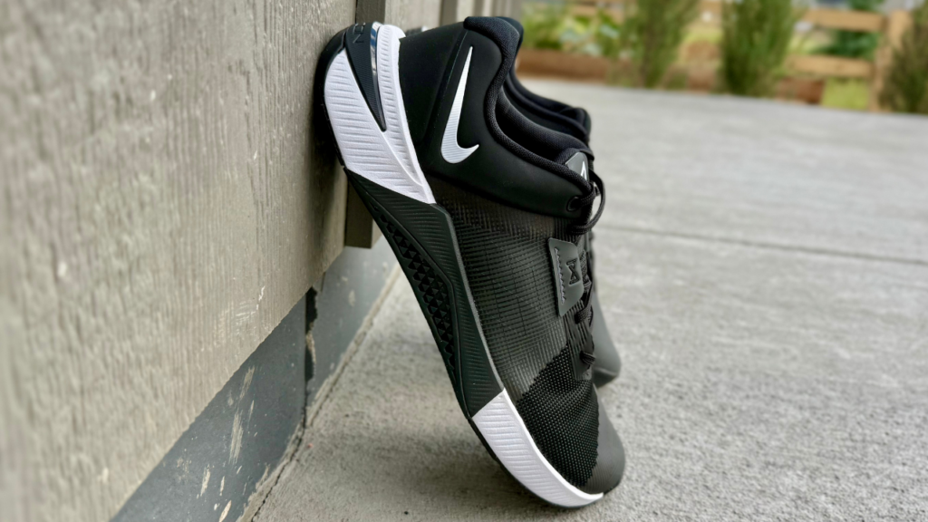 Nike Metcon 10 leaning on wall