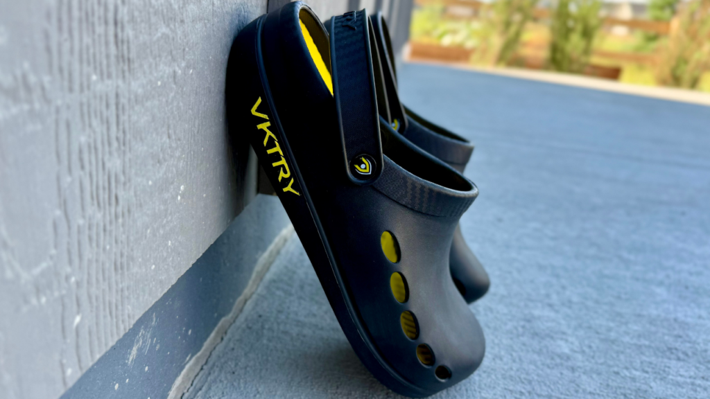 VKTRY Recovery Clog leaning on wall