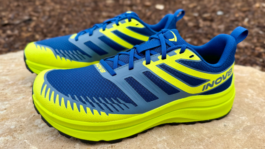 Inov-8 Trailfly Max both shoes on rock