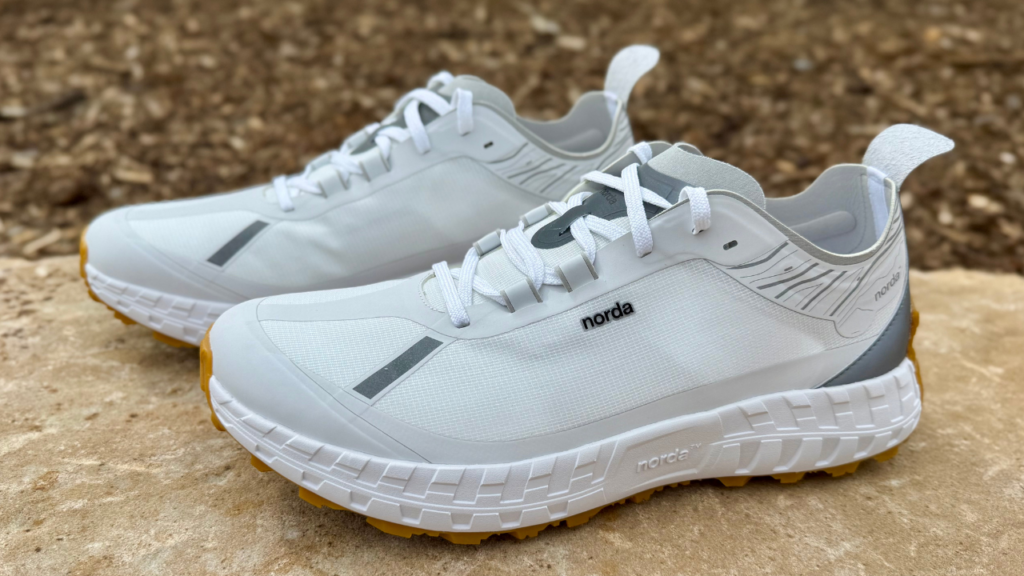 Norda 001A both shoes on rock