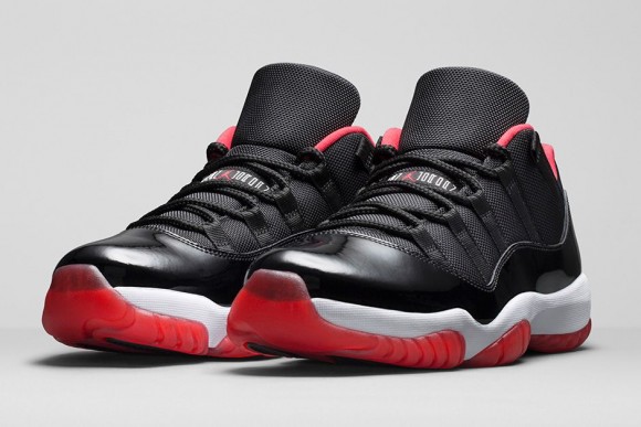 black and red low top 11s