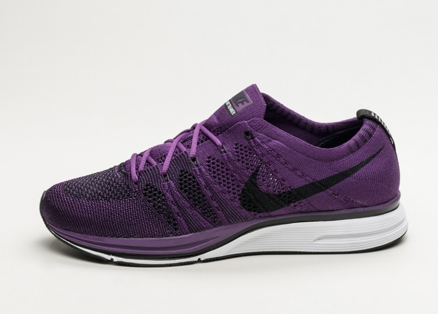 purple nike runners
